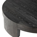 Featuring Sheffield Charcoal Oak Veneer Coffee Table by Four Hands at Amethyst Home. Made from thick, charcoal-finished oak, a rounded coffee table features four legs that pull through to the top, for an intriguing design detail.Overall Dimensions: 48.00"w x 48.00"d x 13.00"hWeight : 94.80 lbsMaterials : Oak Veneer. Amethyst Home provides interior design, new construction, custom furniture, and area rugs in the Monterey metro area