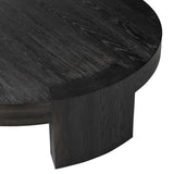 Featuring Sheffield Charcoal Oak Veneer Coffee Table by Four Hands at Amethyst Home. Made from thick, charcoal-finished oak, a rounded coffee table features four legs that pull through to the top, for an intriguing design detail.Overall Dimensions: 48.00"w x 48.00"d x 13.00"hWeight : 94.80 lbsMaterials : Oak Veneer. Amethyst Home provides interior design, new construction, custom furniture, and area rugs in the Omaha metro area