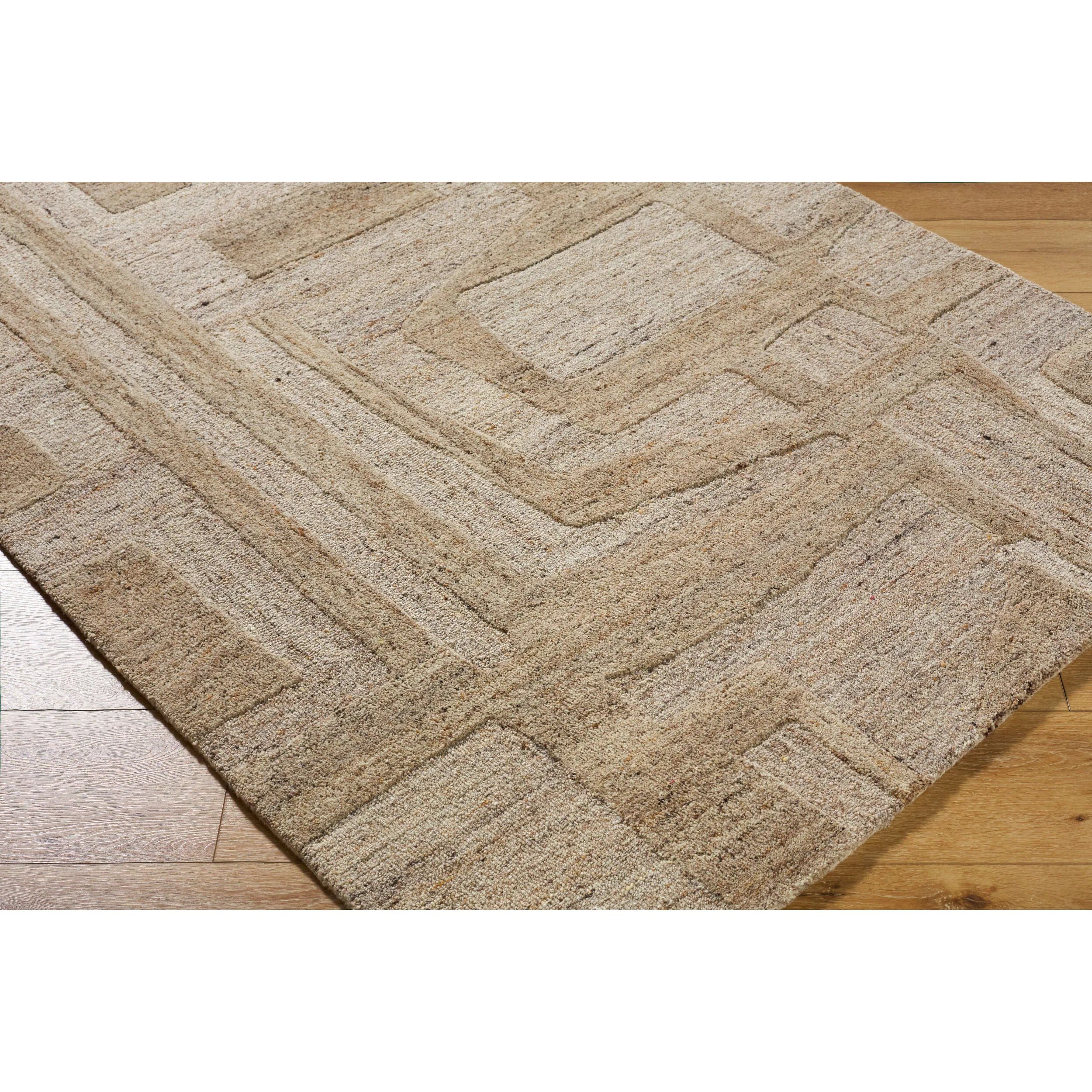 Transform your living space with the Dundee handmade rug, a stunning piece that epitomizes Bohemian Global style. Crafted in India from luxurious wool and meticulously hand-tufted, this rug features a medium pile that adds just the right amount of plush comfort underfoot. Amethyst Home provides interior design, new home construction design consulting, vintage area rugs, and lighting in the Charlotte metro area.