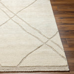 Featuring Tunus Cream Hand-Knotted Rug by Surya at Amethyst Home. The Tunus Cream Rug features a globally inspired design made from New Zealand wool. The hand-knotted rug adds wabi sabi charm to any room.
Hand-Knotted100% Wool
Clean spills immediately by blotting with a clean, dry sponge or cloth. Professional cleaning recommended. Appropriate rug pad is highly. Amethyst Home provides interior design, new home construction design consulting, vintage area rugs, and lighting in the Omaha metro area.