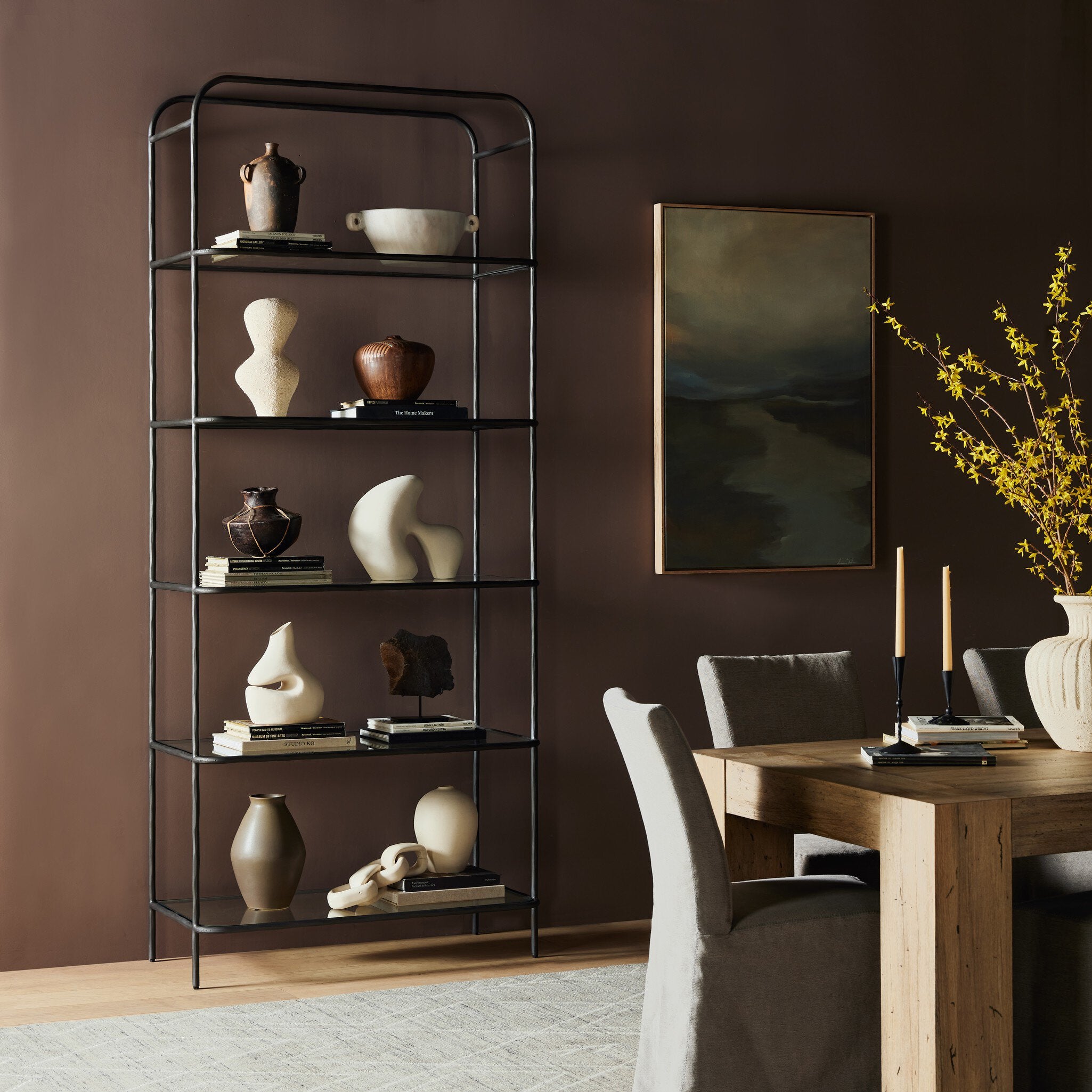 Featuring Swinton Hammered Aged Brass Bookcase by Four Hands at Amethyst Home. Hammered gunmetal-finished iron frames tempered glass shelving, for a transitional look with subtle vintage vibes.82"Overall Dimensions: 38.00"w x 20.75"d x 82.00"hWeight: 227.87 lbs102"Overall Dimensions: 42.00"w x 20.75"d x 102.00"hWeight: 293.21 lbsMaterials : Iron, Glass. Amethyst Home provides interior design, new construction, custom furniture, and area rugs in the Salt Lake City metro area