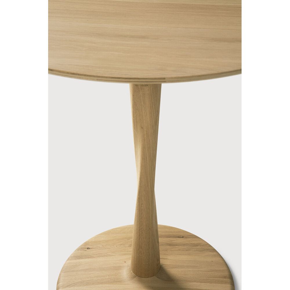 Featuring Torsion Oak Round Dining Table by Ethnicraft at Amethyst Home. Airy with subtle complexities, the Torsion dining table incorporates advanced woodworking techniques to create a light solid oak table top with a torsaded base of sculptural elegance.Weight : 68 lbs Dimensions: 35.5" W x 35.5" L x 27.5" H. Amethyst Home provides interior design, new construction, custom furniture, and area rugs in the Park City metro area