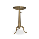Featuring Umi Dark Matte Brass End Table by Four Hands at Amethyst Home. Made from solid brass with a dark matte finish, a slim, versatile end table features a telescope post for height adjustability, plus a tray-style top, perfectly sized to keep your favorite book or drink within reach.Overall Dimensions: 12.25"w x 12.25"d x 25.00"hWeight : 12.39 lbsMaterials : Brass. Amethyst Home provides interior design, new construction, custom furniture, and area rugs in the Salt Lake City metro area