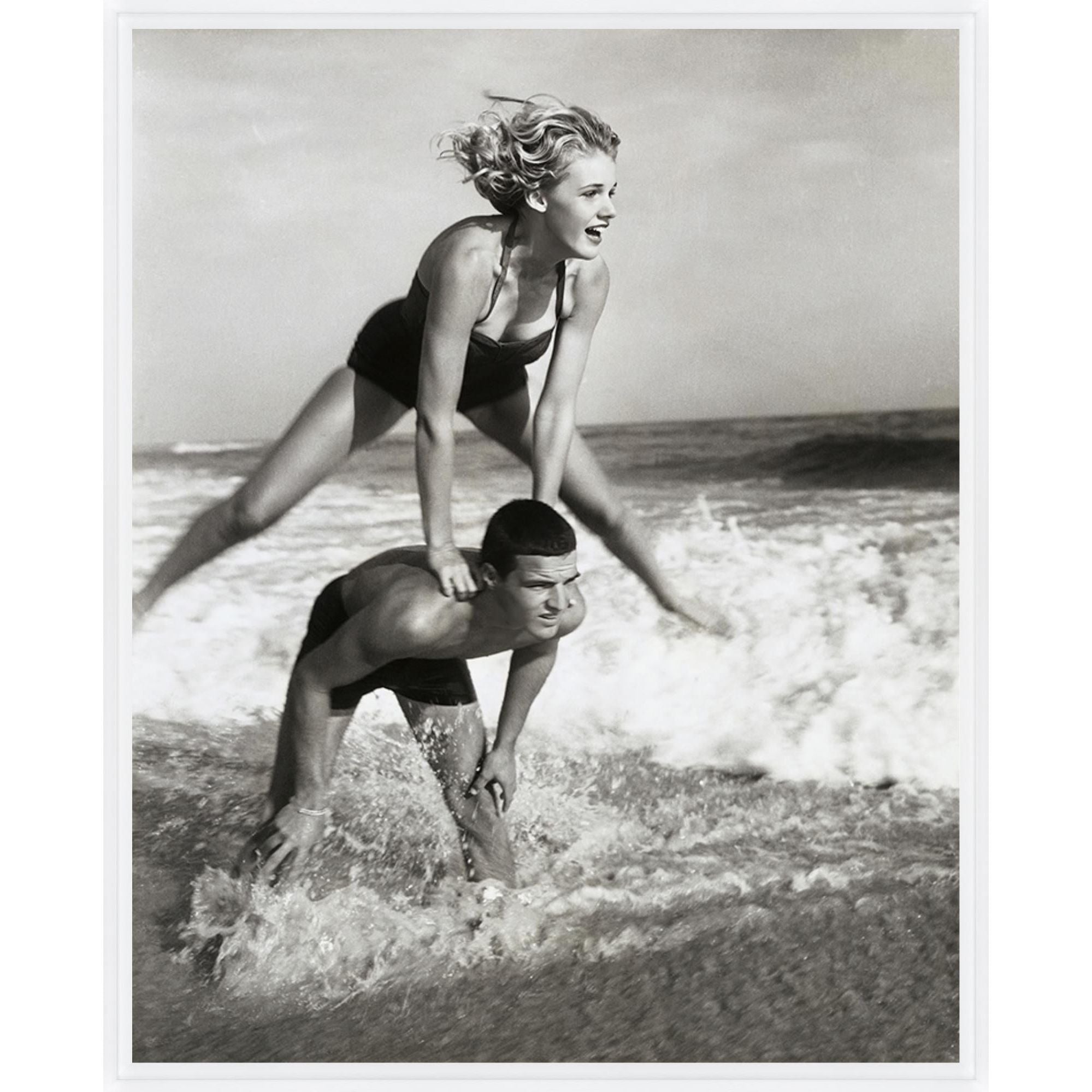 Featuring Young Couple Playing Leapfrog in Surf Art by Leftbank Art at Amethyst Home. Experience the joy and playfulness of young love with this beautiful piece of art. Featuring a couple playing leapfrog in the surf, this artwork captures the carefree spirit and energy of youth. Add a touch of whimsy to your home decor and feel the love radiating from this stunning piece.
Finis. Amethyst Home provides interior design, new construction, custom furniture, and area rugs in the Los Angeles metro area