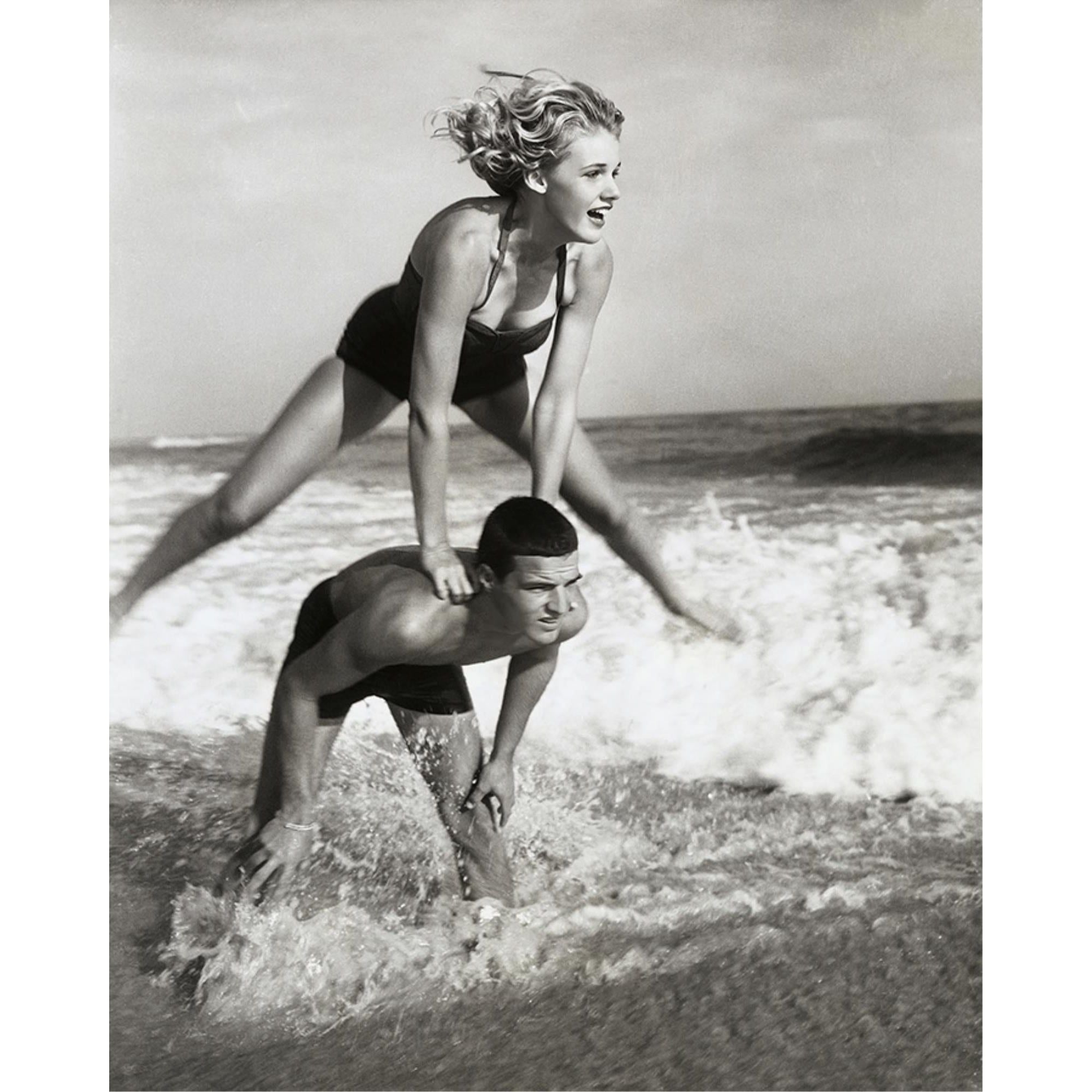 Featuring Young Couple Playing Leapfrog in Surf Art by Leftbank Art at Amethyst Home. Experience the joy and playfulness of young love with this beautiful piece of art. Featuring a couple playing leapfrog in the surf, this artwork captures the carefree spirit and energy of youth. Add a touch of whimsy to your home decor and feel the love radiating from this stunning piece.
Fi. Amethyst Home provides interior design, new construction, custom furniture, and area rugs in the Salt Lake City metro area