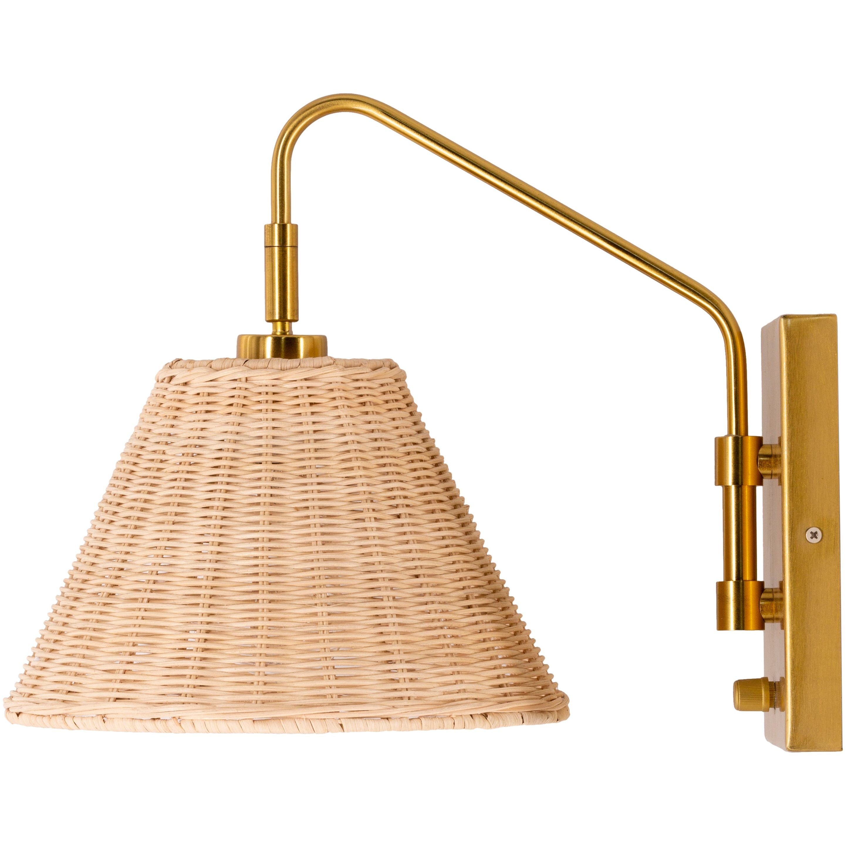 Featuring Stephi Wall Sconce by Surya at Amethyst Home. A fab mix of rattan and brass -- the Stephi wall sconce is a beautiful way to upgrade a space.  Enjoy a pivot shade and a cute little knob to turn on and off.
Fixture Dimensions: 15"L x 10"W x 12"HE-26/40 WUL CUL Certified.  Amethyst Home provides interior design, new home construction design consulting, vintage area rugs, and lighting in the Dallas metro area.