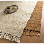 Featuring Vienne Bleached Jute Rug with Fringe by Surya at Amethyst Home. Hand-woven of natural jute, this Vienne rug adds a calming, grounding presence to every space.  We love its chunky texture under foot and it's carefree fringe for a stress-free look.
Hand-wovenNatural jute.  Amethyst Home provides interior design, new home construction design consulting, vintage area rugs, and lighting in the Kansas City metro area.