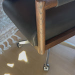 An Amethyst fave -- the Levi Black Leather Desk Chair is modern yet inviting.  Gorgeous black leather with a sleek side profile, this desk chair will elevate your office. Amethyst Home provides interior design, new home construction design consulting, vintage area rugs, and lighting in the Monterey metro area.