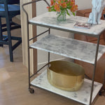 Entertain with style.  Beautiful natural marble shelves with a brass frame instantly infuses your space with style.Overall Dimensions: 30.00"w x 16.00"d x 36.25"hWeight : 85.98 lbsMaterials : Iron, Solid Marble Amethyst Home provides interior design, new home construction design consulting, vintage area rugs, and lighting in the Calabasas metro area.