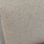 Modern, clean shaping meets inflated comfort with this padded, upholstered bed frame in a textural boucle-like pattern.  Text(251) 257-7986 for quick product details.Overall Dimensions: 92.25"W x 89.25"L x 48"H Amethyst Home provides interior design, new home construction design consulting, vintage area rugs, and lighting in the Seattle metro area.