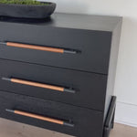 Introducing the Rosedale Ebony Oak Veneer 8 Drawer Dresser - the epitome of luxury and sophistication. With its sleek ebony oak veneer finish and 8 spacious drawers, this dresser is the perfect addition to any elegant bedroom. Organize your clothes and elevate your decor with this stunning piece. Amethyst Home provides interior design, new home construction design consulting, vintage area rugs, and lighting in the Nashville metro area.