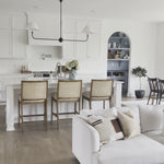 Finished in a beautifully classic washed oak, the Gregory Black Oak Dining Chair features a yoke-like back and widened supports, placing a fresh twist on the traditional Windsor. Amethyst Home provides interior design, new home construction design consulting, vintage area rugs, and lighting in the Winter Garden metro area.