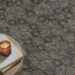 Hand-knotted of 100% wool, the Amara Ink/Turquoise Rug creates a casual yet refined vibe with high-end appeal. Showcase in your bedroom, living room, entryway, or other high-traffic area of your home. Amethyst Home provides interior design, consulting for new home construction, area rugs, vintage rugs, and bedding for the Kansas City metro area.