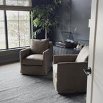 The Freddy Leather Swivel Chair is a slipcovered, leather swivel chair -- perfect for moody rooms. The chair features a comfortable, plush back and supportive seat. Please expect natural distressing. Amethyst Home provides interior design, new home construction design consulting, vintage area rugs, and lighting in the Calabasas metro area.