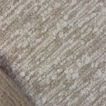 A modern take on a 70s-inspired shape. This sink-in, pillow-like chair features S-spring suspension for extra comfort and durability in the seat, all on a 360-degree swivel. Upholstered in an exaggerated boucle fabric with extra depth and texture throughout. Amethyst Home provides interior design, new home construction design consulting, vintage area rugs, and lighting in the Nashville metro area.