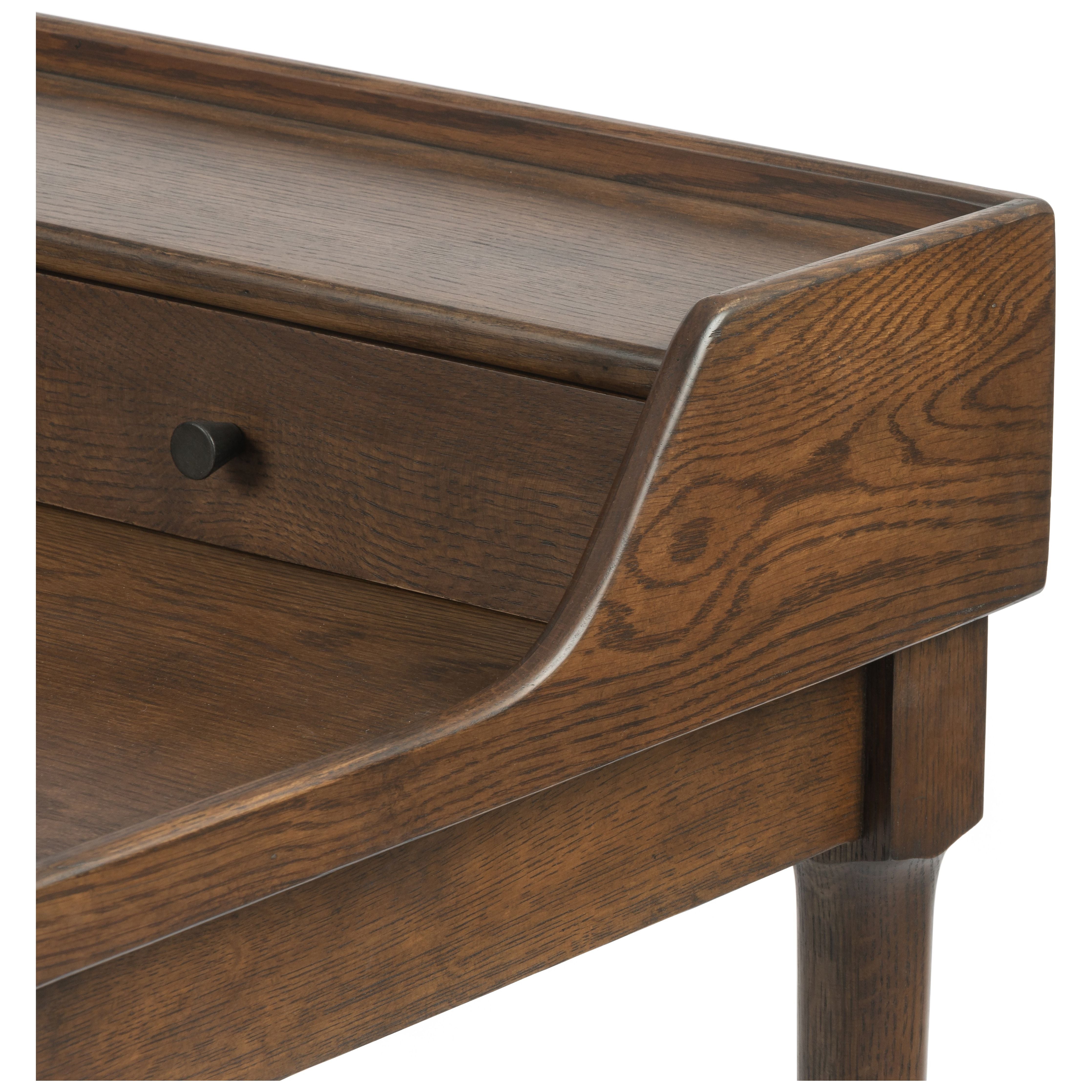 Featuring Moreau Writing Desk by Four Hands at Amethyst Home. Dark-toasted oak's rich brown finish speaks to mid-century inspiration, while plenty of storage meets the needs of a modern office with this Moreau Dark Toasted Oak Writing Desk. 
Overall Dimensions: 48"W x 23.5"L x 34.75"H
Colors: Dark Toasted Oak, Aged BlackMaterials: Solid Oak, IronWeight: .  Amethyst Home provides interior design, new home construction design consulting, vintage area rugs, and lighting in the Los Angeles metro area.
