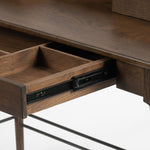 Featuring Moreau Writing Desk by Four Hands at Amethyst Home. Dark-toasted oak's rich brown finish speaks to mid-century inspiration, while plenty of storage meets the needs of a modern office with this Moreau Dark Toasted Oak Writing Desk. 
Overall Dimensions: 48"W x 23.5"L x 34.75"H
Colors: Dark Toasted Oak, Aged BlackMaterials: Solid Oak, IronWeight: 7.  Amethyst Home provides interior design, new home construction design consulting, vintage area rugs, and lighting in the Scottsdale metro area.
