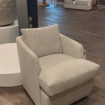 This Whittaker Swivel Chair - Merino Cotton is a comfortable classic. Atop a 360-degree swivel base, well-tailored cotton seating provides a beautifully simple place to perch in style, with feather-blend cushioning for total relaxation -- the perfect chair for a baby room, living room, or other area.   Overall Dimensions: 28.75"w x 35.00"d x 35.50"h