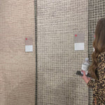 Inspired by textural watercolors, the Giana Smoke Area Rug combines a relaxed grid with soft variations of smokey creams for an effortless and sophisticated look. Each area rug is hooked of 100% wool by artisans for a beautiful textural layer to your home. The soft textures of this area rug bring warmth and coziness to any room.  Hooked 100% Wool GH-01 Smoke