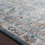 The Layla Collection is traditional and timeless, with a beautiful lived-in design that captures the spirit of an old-world rug. This traditional power-loomed rug is crafted of 100% polyester with a classic and sophisticated color palette and subtle patina.  Power Loomed 100% Polyester LAY-07 Blue/Tangerine