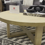 Made from solid natural nettlewood, an open cross-style base supports a thick, rounded tabletop finished with a soft hand on this Liad Coffee Table - Natural Nettlewood. We'd love to see this in your living room or lounge area! Amethyst Home provides interior design, new home construction design consulting, vintage area rugs, and lighting in the San Diego metro area.