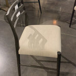 We love the ladderback chair of this Glenmore Light Carbon Dining Chair. The carbon-toned seating blends cotton with linen and elevates the space for any dining room or kitchen area.   Overall Dimensions: 21.75"w x 22.00"d x 34.00"h Seat Depth: 17.72" Seat Height: 18.9"