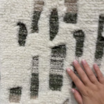 The Loloi Bennett Ivory / Forest Area Rug, or BEN-06, is hand-knotted of wool, viscose and polyester in India. Featuring a new carve like high-low pile, Bennett has an ivory base with abstract tonal designs. Plus, it's plush underfoot-- a great choice for your office, bedroom, or other medium traffic areas.