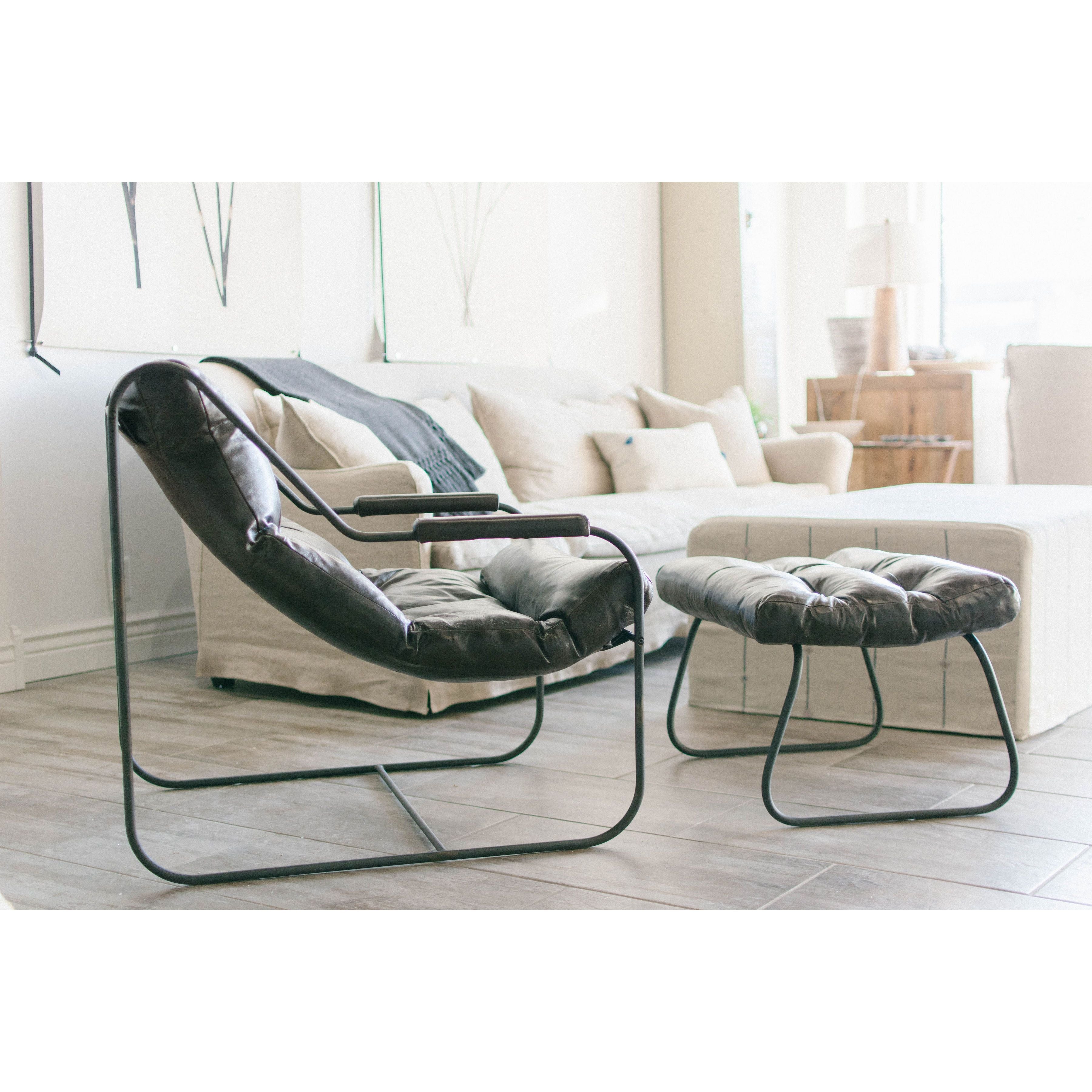 Featuring Brando Leather Chair Set by Cisco Brothers at Amethyst Home. Like "sitting in an American baseball glove" -- the Brando Leather Chair Set from Cisco Brothers was love at first sit in this unique chair! We compare the feel to sitting in a hammock. As shown in Spur Terracotta, Grade 500 leather.
Size: 27"w x 36"d x 32"hSeat space: 25"w x 19"d x 17. Amethyst Home provides interior design, new home construction design consulting, vintage area rugs, and lighting in the Des Moines metro area.