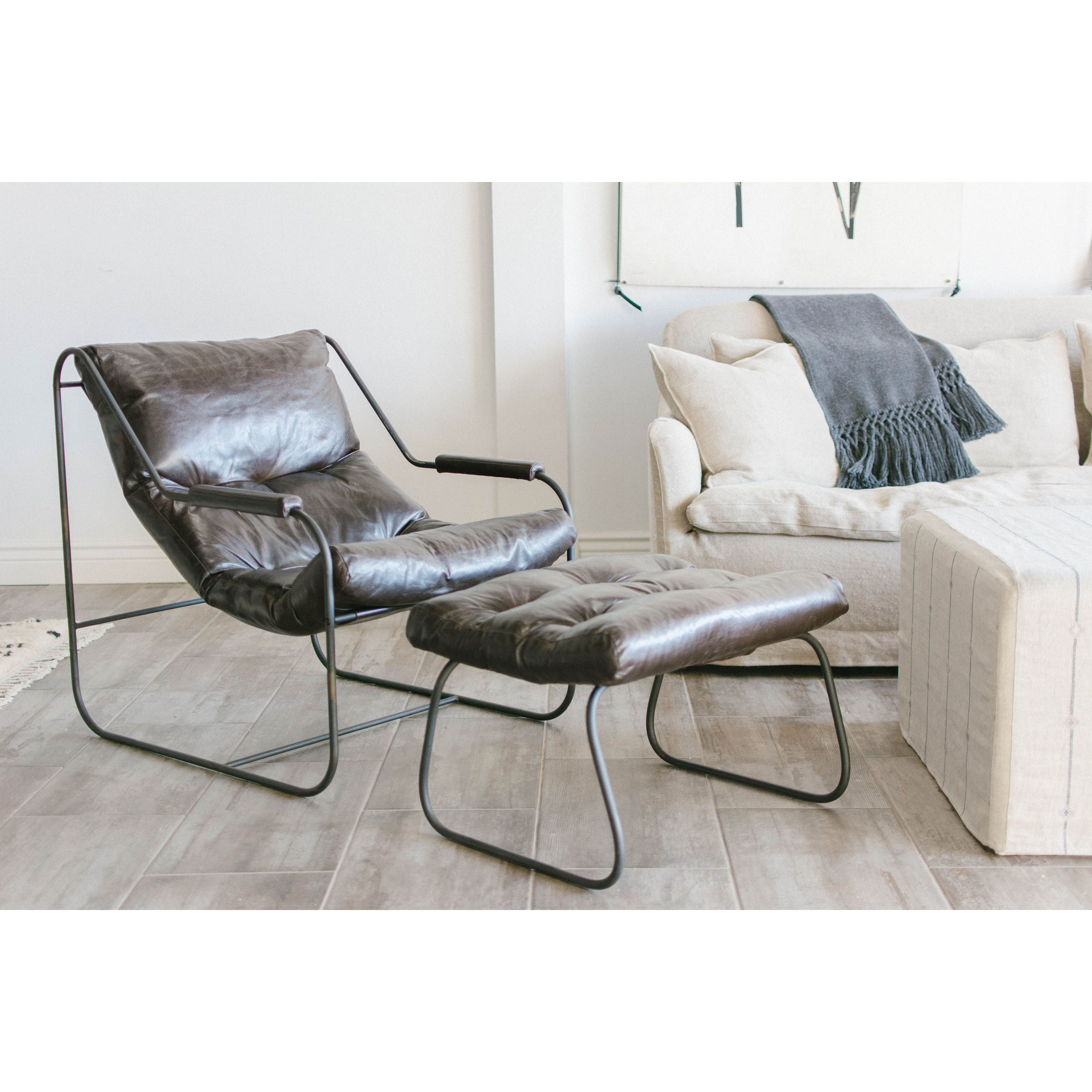 Featuring Brando Leather Chair Set by Cisco Brothers at Amethyst Home. Like "sitting in an American baseball glove" -- the Brando Leather Chair Set from Cisco Brothers was love at first sit in this unique chair! We compare the feel to sitting in a hammock. As shown in Spur Terracotta, Grade 500 leather.
Size: 27"w x 36"d x 32"hSeat space: 25"w x 19"d x 17.5"hO. Amethyst Home provides interior design, new home construction design consulting, vintage area rugs, and lighting in the Omaha metro area.