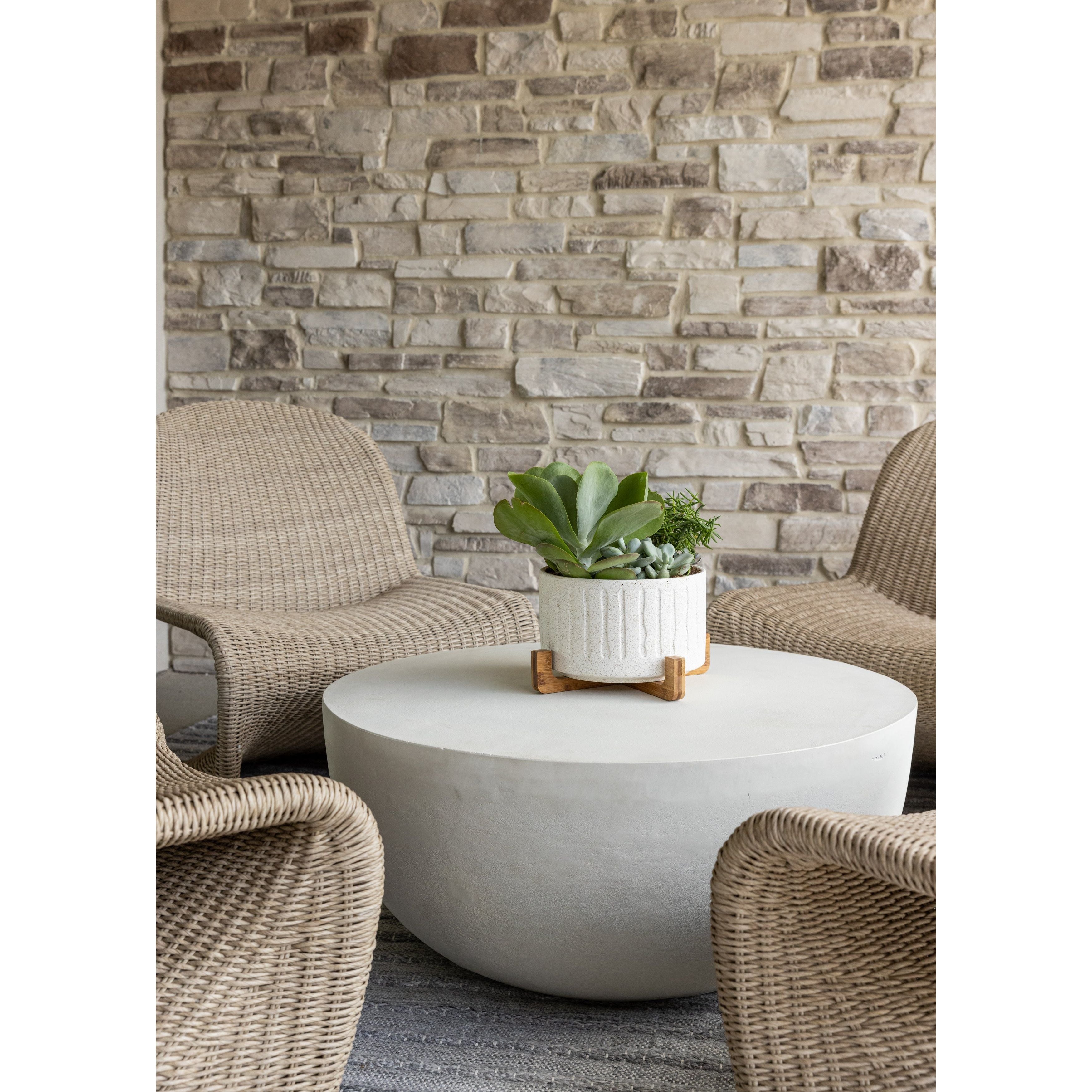Featuring Drum Iron Coffee Table - Matte White by Four Hands at Amethyst Home. Our favorite Drum Iron Coffee Table now comes in a gorgeous matte white finish. This brings a sleek, simple look to any space.  We love the look inside but it is also outdoor grade.
Overall Dimensions: 36"W x 36"L x 15"H
Colors: Matte White Cast AluminumMaterials: AluminumWeight. Amethyst Home provides interior design, new home construction design consulting, vintage area rugs, and lighting in the Scottsdale metro area.