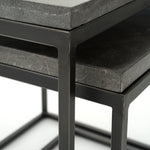 Featuring Harlow Nesting Tables - Set of 2 by Four Hands at Amethyst Home. Spare beauty, casual elegance. A gunmetal-finished Parsons base with hand-rubbed, dimensional edges supports two rough-hewn bluestone slabs that feel found and perfectly placed.
Dimensions: Large 20"W x 16"L x 19"H  ; Small 17"W x 13.5"L x 16"HColors: Gunmetal, BluestoneMaterials: Iro.  Amethyst Home provides interior design, new home construction design consulting, vintage area rugs, and lighting in the Austin metro area.