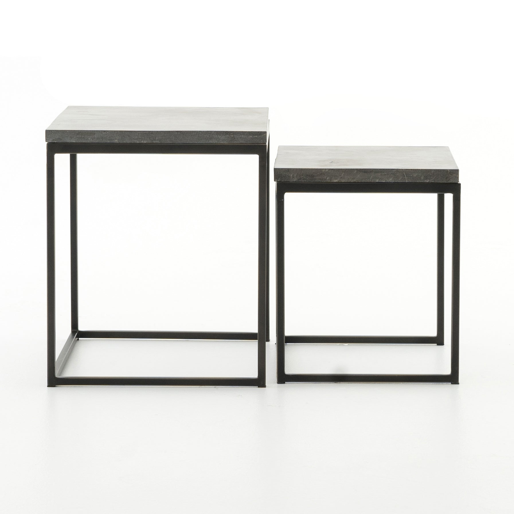 Featuring Harlow Nesting Tables - Set of 2 by Four Hands at Amethyst Home. Spare beauty, casual elegance. A gunmetal-finished Parsons base with hand-rubbed, dimensional edges supports two rough-hewn bluestone slabs that feel found and perfectly placed.
Dimensions: Large 20"W x 16"L x 19"H  ; Small 17"W x 13.5"L x 16"HColors: Gunmetal, BluestoneMateri.  Amethyst Home provides interior design, new home construction design consulting, vintage area rugs, and lighting in the Salt Lake City metro area.
