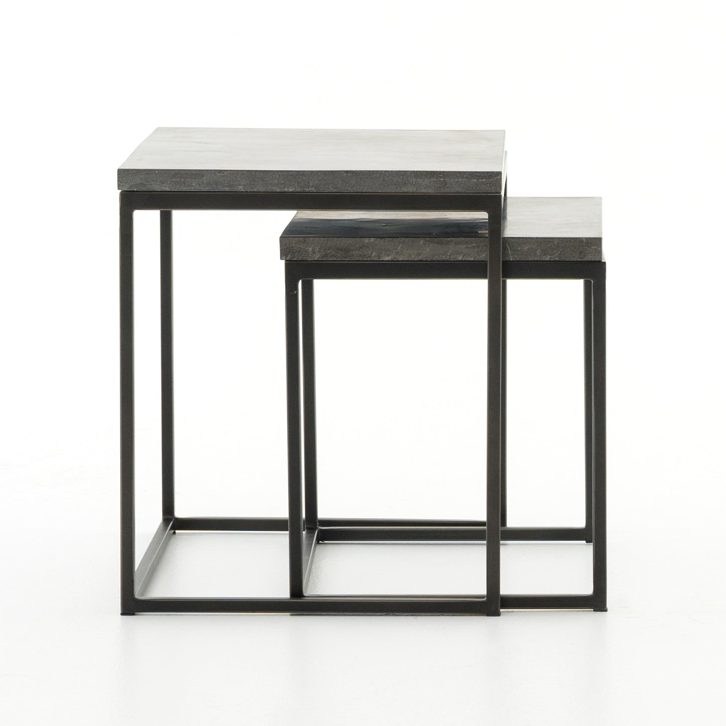 Featuring Harlow Nesting Tables - Set of 2 by Four Hands at Amethyst Home. Spare beauty, casual elegance. A gunmetal-finished Parsons base with hand-rubbed, dimensional edges supports two rough-hewn bluestone slabs that feel found and perfectly placed.
Dimensions: Large 20"W x 16"L x 19"H  ; Small 17"W x 13.5"L x 16"HColors: Gunmetal, BluestoneMaterials: .  Amethyst Home provides interior design, new home construction design consulting, vintage area rugs, and lighting in the Charlotte metro area.