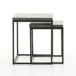 Featuring Harlow Nesting Tables - Set of 2 by Four Hands at Amethyst Home. Spare beauty, casual elegance. A gunmetal-finished Parsons base with hand-rubbed, dimensional edges supports two rough-hewn bluestone slabs that feel found and perfectly placed.
Dimensions: Large 20"W x 16"L x 19"H  ; Small 17"W x 13.5"L x 16"HColors: Gunmetal, BluestoneMaterials: .  Amethyst Home provides interior design, new home construction design consulting, vintage area rugs, and lighting in the Charlotte metro area.