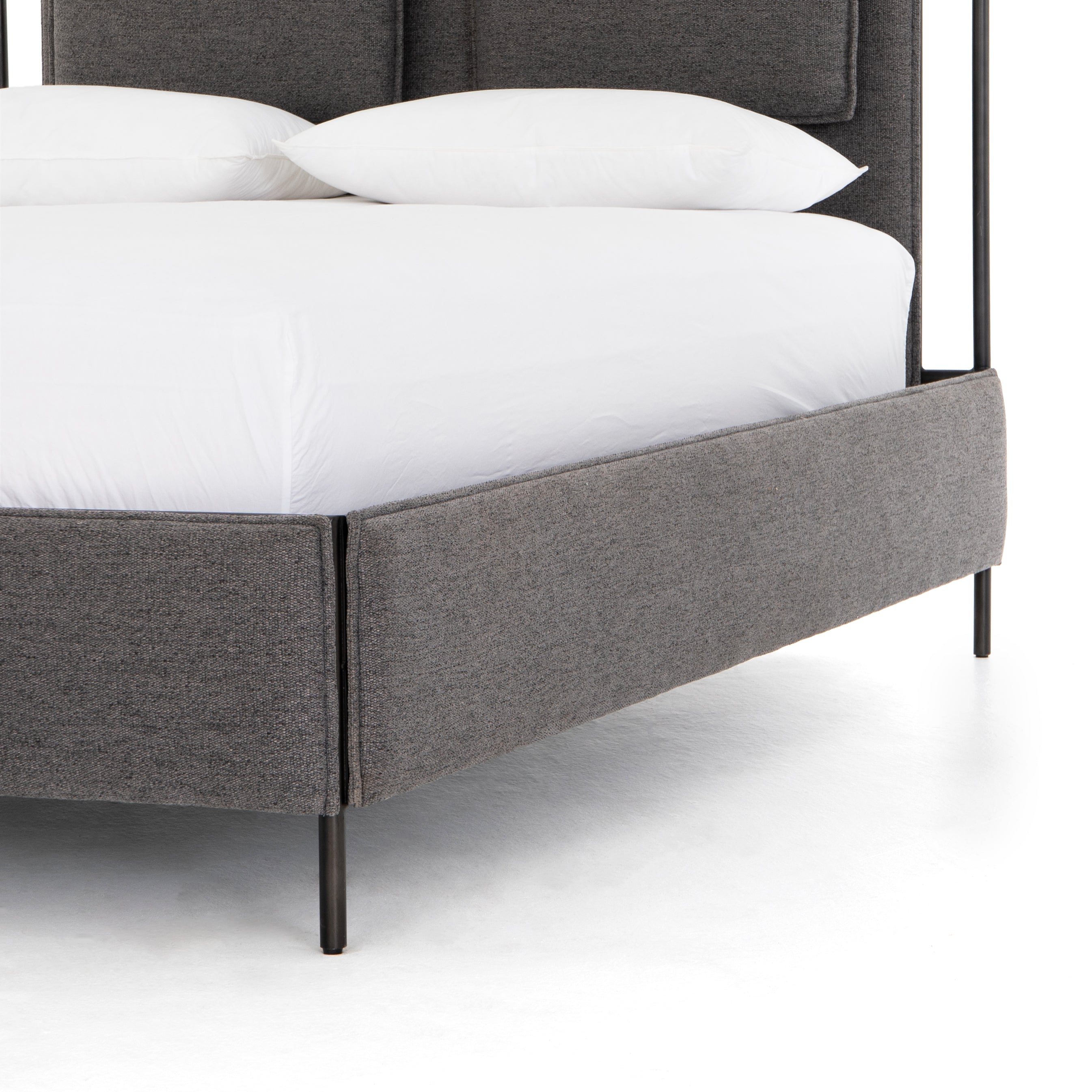 Featuring Leigh Upholstered Bed - San Remo Ash by Four Hands at Amethyst Home. The black straps on this Leigh San Remo Ash Upholstered Bed give any bedroom a stylish, modern look. 
Queen Size: 65"W x 84.5"L x 60.25"HKing Size: 80.75"W x 84.5"L x 60.25"H
Colors: San Remo Ash, Distressed Black, Waxed Black (pc)Materials: 100% Polyester, 85% Pl, 15% Pu, Iron.  Amethyst Home provides interior design, new home construction design consulting, vintage area rugs, and lighting in the San Diego metro area.