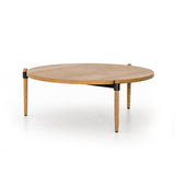 Featuring Holmes Coffee Table by Four Hands at Amethyst Home. Stunning simplicity with a Danish-inspired spin. A rounded tabletop of smoked drift oak offsets a triad of slim, tapered legs. Waxed black joinery adds a fresh look of high contrast. Pair with matching cocktail table for a nested, layered look.
Overall Dimensions: 43"W x 43"L x 14.75"H
Colors: S.  Amethyst Home provides interior design, new home construction design consulting, vintage area rugs, and lighting in the Charlotte metro area.