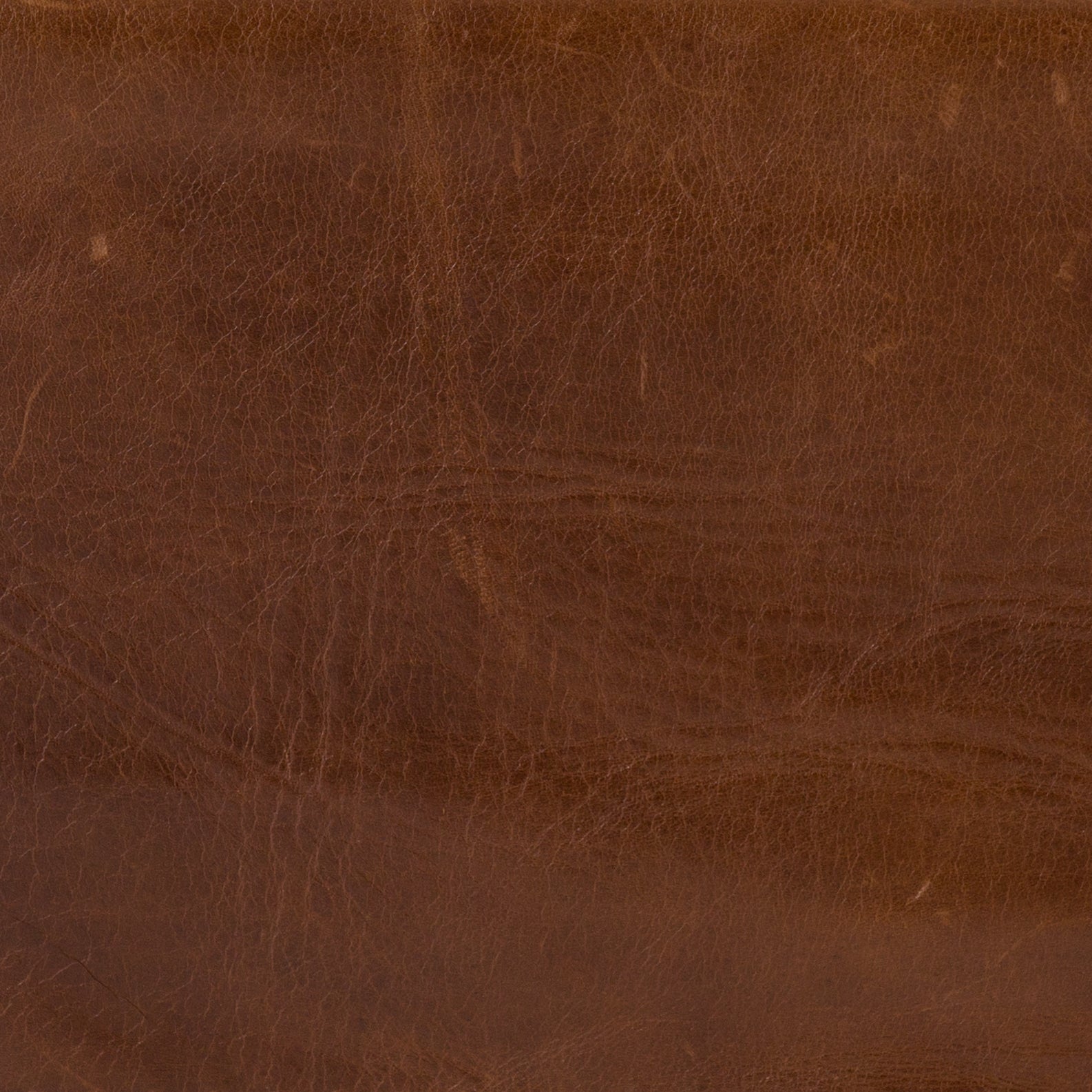 Featuring Emmett Sling Chair - Leather by Four Hands at Amethyst Home. Super stylish, effortlessly cool. Sling-style seating of tobacco-toned leather sits low and curved for a fresh take on a throwback form. Slim, gunmetal-finished iron framing ups the drama factor of an innately hip design.
Overall Dimensions: 29"W x 36"L x 29"HColors: Dakota Tobacco, Gunmeta.  Amethyst Home provides interior design, new home construction design consulting, vintage area rugs, and lighting in the Miami metro area.