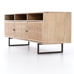Featuring Carmel Media Console - Natural Mango by Four Hands at Amethyst Home. We love the organic feel of this Carmel Natural Mango Media Console. The shelves and posterior cord management make this the perfect media console for families wanting extra storage, while also adding a mid-century look to the room. 
Overall Dimensions: 65"W x 18"L x 24"H
Colors: Na.  Amethyst Home provides interior design, new home construction design consulting, vintage area rugs, and lighting in the Omaha metro area.