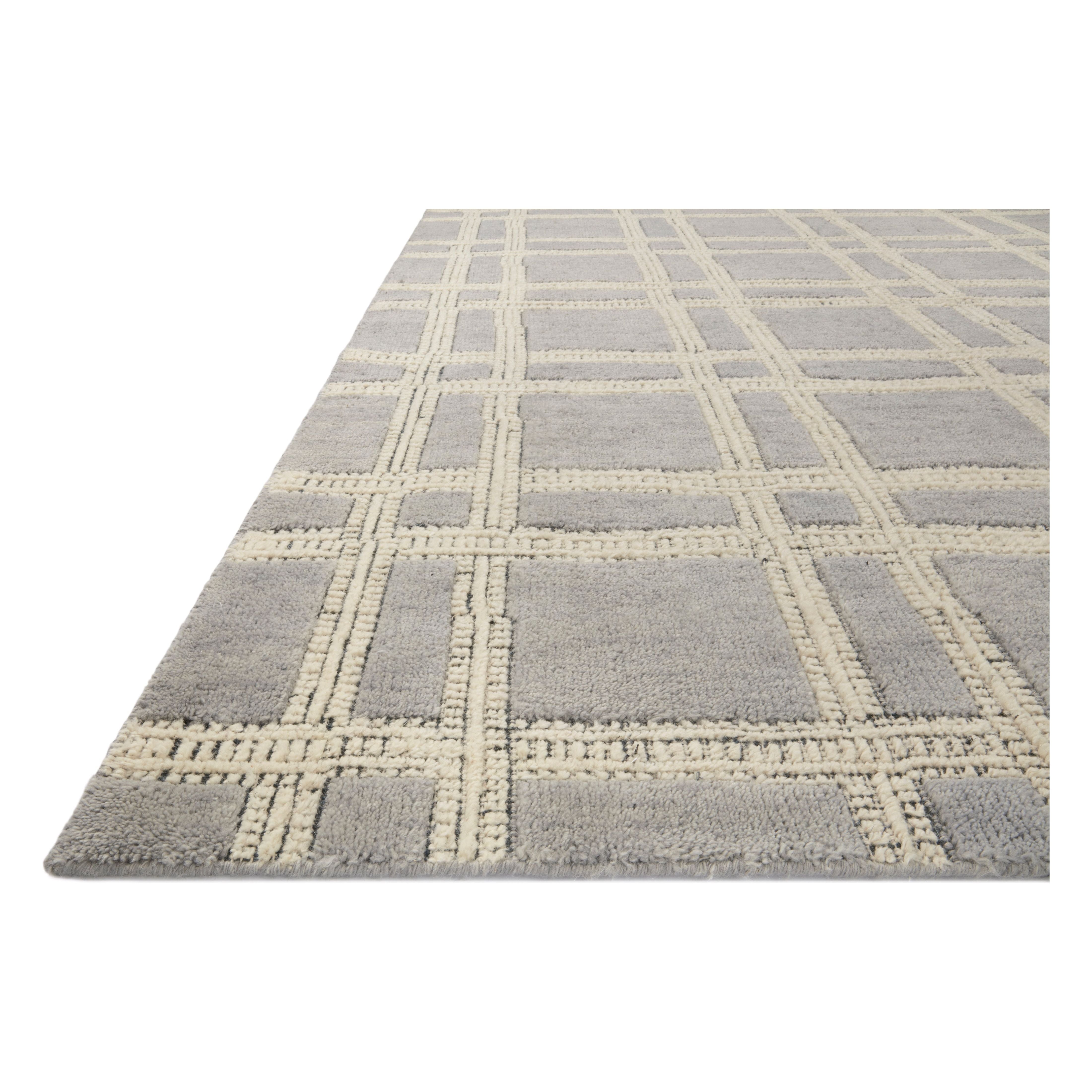 Featuring Carrier & Company x Loloi Milton Grey / Ivory Rug by Loloi at Amethyst Home. Carrier & Company x Loloi Milton Grey / Ivory Rug uses a banding detail to express the rich and plush pile. The addition of jute to the wool and cotton rugs creates a luxurious density that can be both seen and felt. As a simple border detail, a graphic plaid, or an over-sc.  Amethyst Home provides interior design, new home construction design consulting, vintage area rugs, and lighting in the Austin metro area.