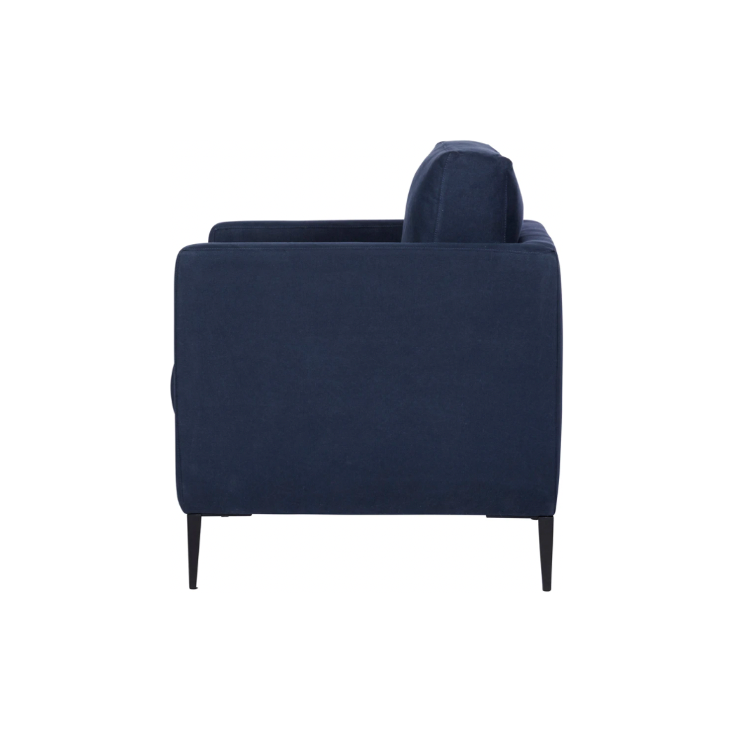 Featuring Benedict Upholstered Chair - Custom by Cisco Brothers at Amethyst Home. The Benedict Chair - Custom by Cisco Brothers is a modern design with clean lines and sleek metal legs in black rust. It has a fresh and functional aesthetic with no-sag support. As a small scale sofa, its ideal for apartment living and suitable for any occasion. Photogra. Amethyst Home provides interior design, new home construction design consulting, vintage area rugs, and lighting in the Winter Garden metro area.