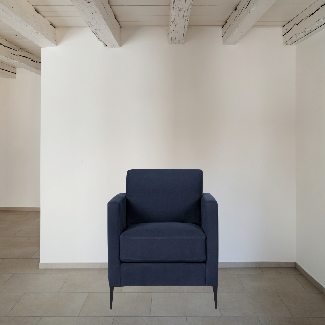 Featuring Benedict Upholstered Chair - Essentials by Cisco Brothers at Amethyst Home. The Benedict Chair - Essentials by Cisco Brothers is a modern design with clean lines and sleek metal legs in black rust. It has a fresh and functional aesthetic with no-sag support. As a small scale sofa, its ideal for apartment living and suitable for any occasion. Photo. Amethyst Home provides interior design, new home construction design consulting, vintage area rugs, and lighting in the Monterey metro area.