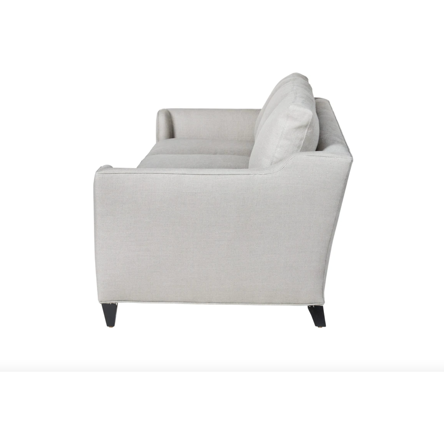 Featuring Gunner Upholstered 84" Sofa by Cisco Brothers at Amethyst Home. A chic, yet simple design, the Gunner Upholstered Sofa by Cisco Brothers boasts a streamlined frame supported by tapered legs. This sofa is beautifully detailed, with piping on the body and top stitch on cushions. It has a traditional yet sleek look, ideal for entertaining. Photographed. Amethyst Home provides interior design, new home construction design consulting, vintage area rugs, and lighting in the Tampa metro area.