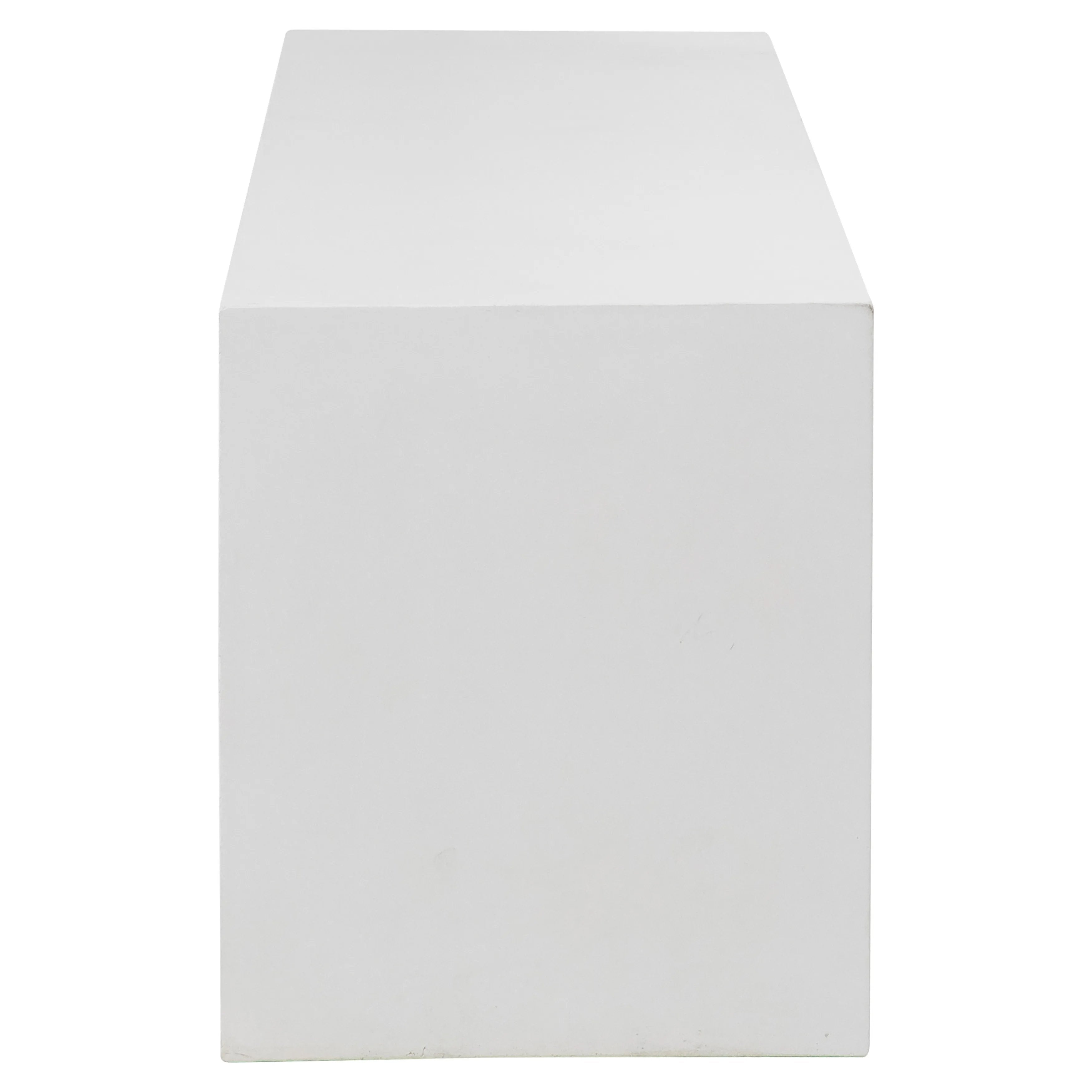 Featuring White Concrete Bench by Dovetail at Amethyst Home. Suitable for both indoor and outdoor settings, this modern bench features a beautiful waterfall design. Naturally attractive and durable, measuring 63” in length, it is constructed with reinforced concrete. Featuring a white sealed finish, this three-seater bench is fresh and contemporary. Ideal a. Amethyst Home provides interior design, new home construction design consulting, vintage area rugs, and lighting in the Charlotte metro area.