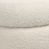 Featuring Jolo Faux Sheepskin Ottoman by Dovetail at Amethyst Home. Faux sheepskin ottoman that works with practically every design vibe.  
17"h x 18"w x 18"d
Spot clean with hydrogen peroxide for a fresh look.. Amethyst Home provides interior design, new home construction design consulting, vintage area rugs, and lighting in the Seattle metro area.