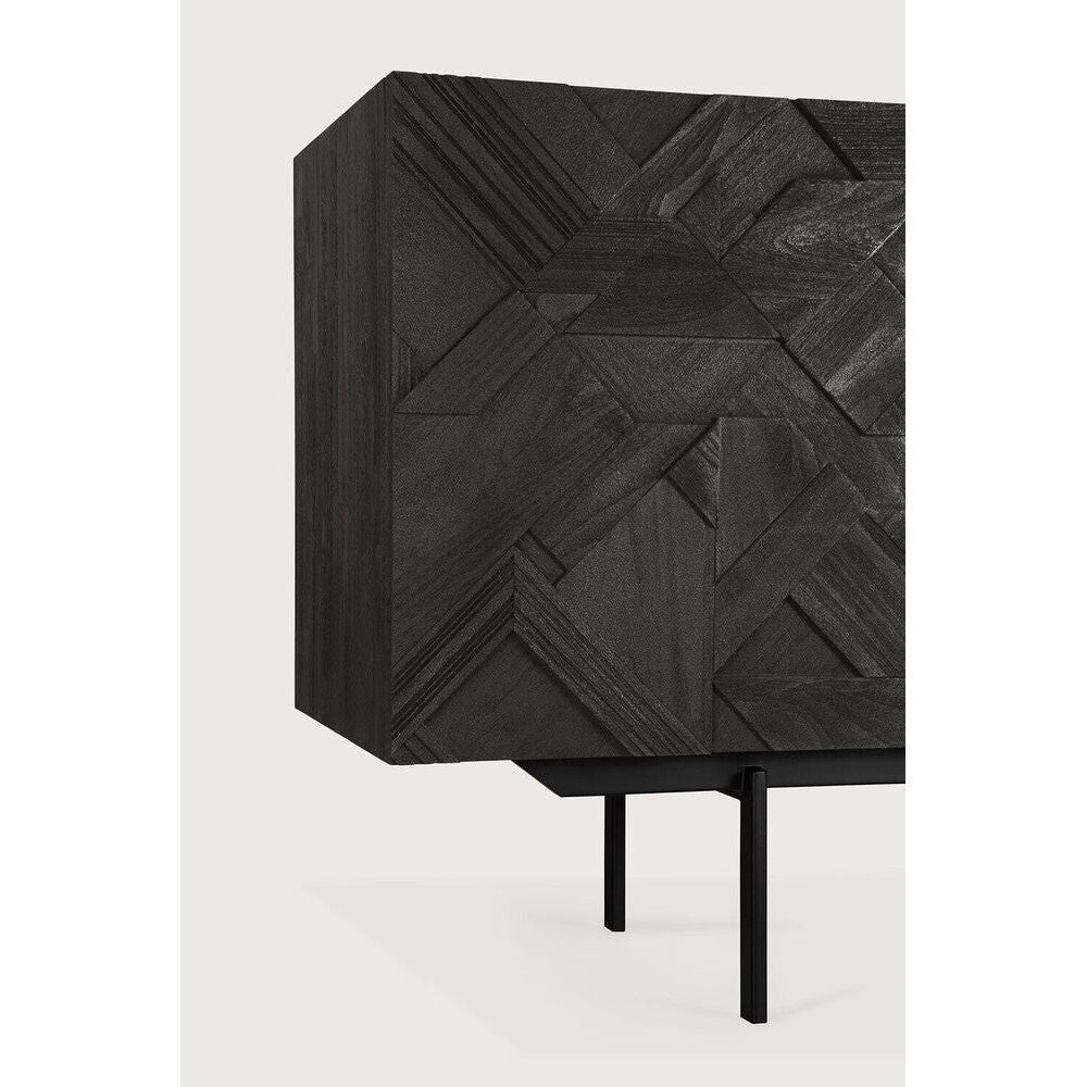 Featuring Graphic Sideboard Teak Black by Ethnicraft at Amethyst Home. In his quest to add movement to the surface, designer Alain van Havre started layering and combining triangular shapes. Before he knew it he had created a visually enticing composition out of teak and the Graphic design was born. By using multiple layers, a sense of depth and dynamism is. Amethyst Home provides interior design, new home construction design consulting, vintage area rugs, and lighting in the Charlotte metro area.
