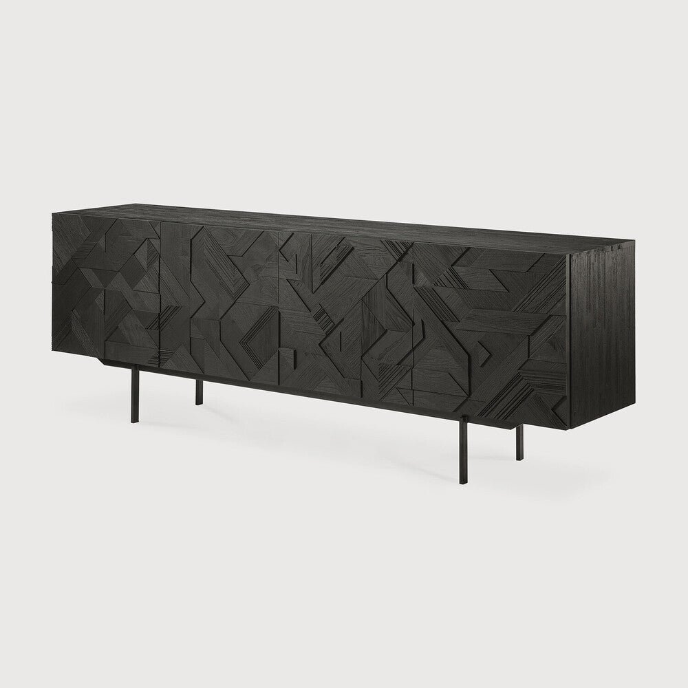 Featuring Graphic Sideboard Teak Black by Ethnicraft at Amethyst Home. In his quest to add movement to the surface, designer Alain van Havre started layering and combining triangular shapes. Before he knew it he had created a visually enticing composition out of teak and the Graphic design was born. By using multiple layers, a sense of depth and dynamism is. Amethyst Home provides interior design, new home construction design consulting, vintage area rugs, and lighting in the Park City metro area.