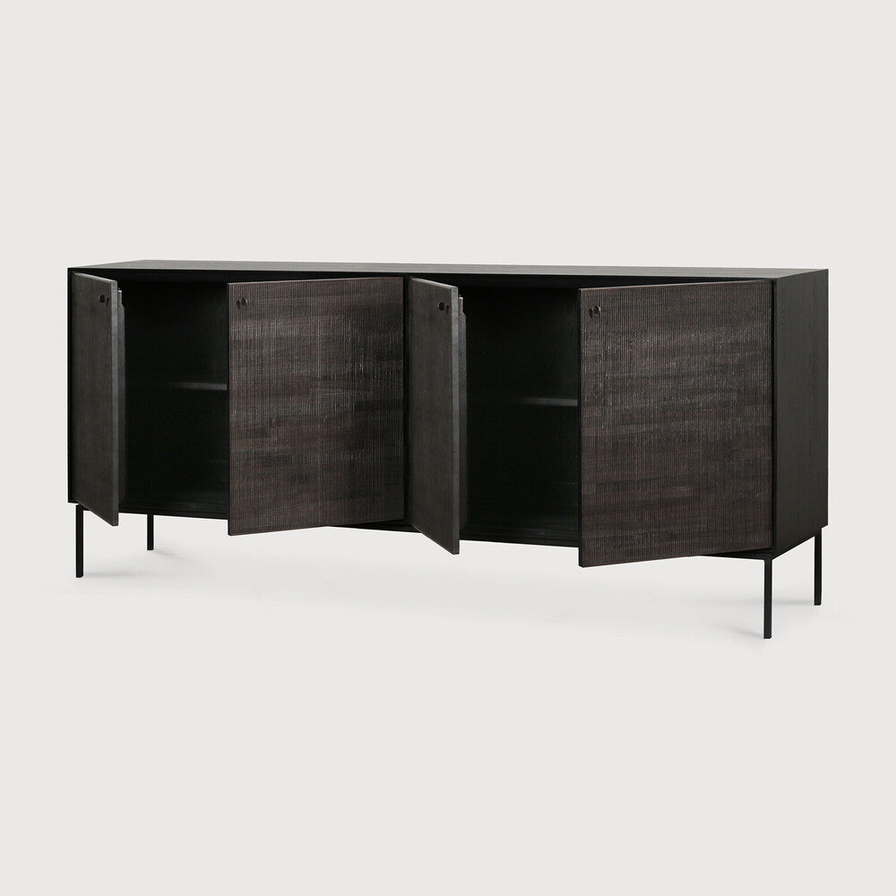 Featuring Grooves Sideboard Teak Black by Ethnicraft at Amethyst Home. The Grooves sideboard is soulful to say the least. Every single line you see is hand carved, making each piece truly unique. Small imperfections are part of the story, even more so: they enhance Grooves' character. The result is a slightly different surface every time, each with its own rhyt. Amethyst Home provides interior design, new home construction design consulting, vintage area rugs, and lighting in the Tampa metro area.