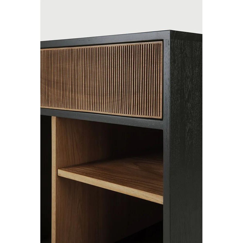 Featuring Oscar Drawer Unit Teak black by Ethnicraft at Amethyst Home. Bringing form and function to your professional way of life, the Oscar collection ticks the right boxes. Featuring hand-carved details in solid teak and the practicality of wheels, the Oscar drawer unit can serve many purposes, fitting perfectly under a desk for extra storage or as a st. Amethyst Home provides interior design, new home construction design consulting, vintage area rugs, and lighting in the Des Moines metro area.