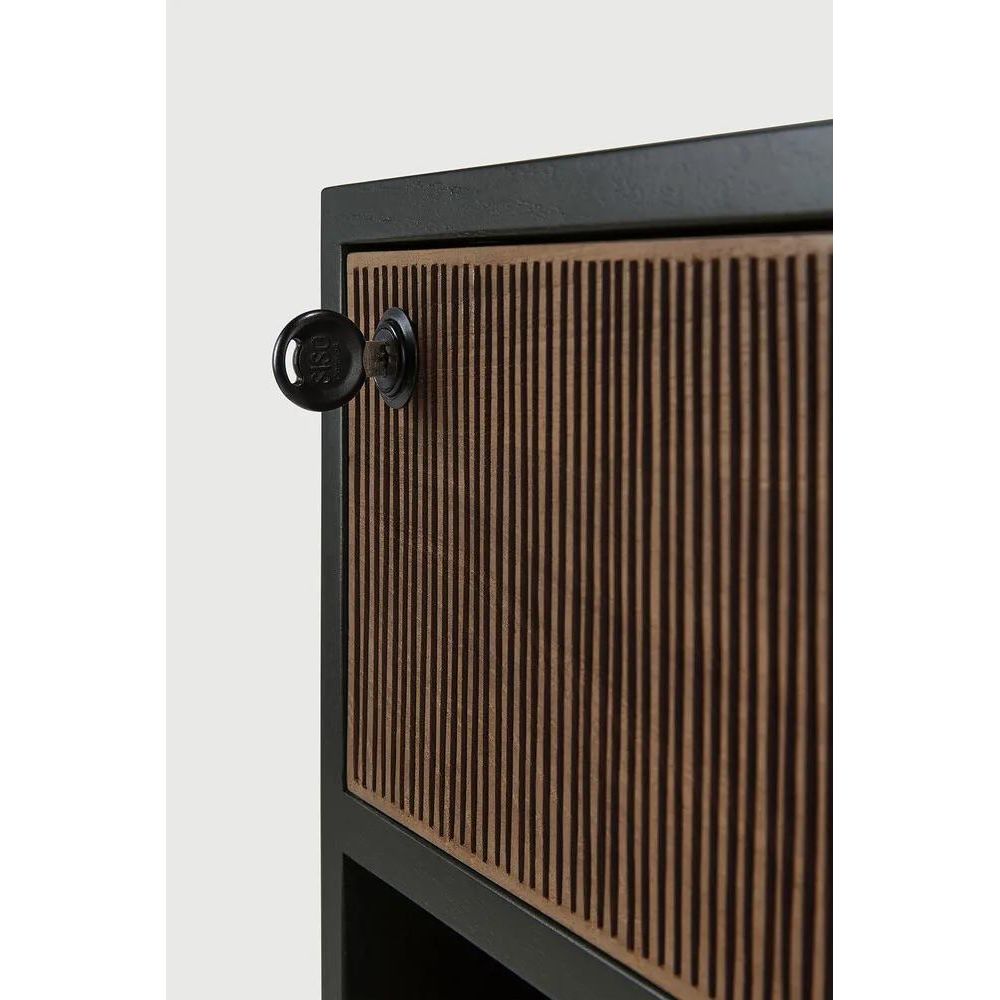 Featuring Oscar Drawer Unit Teak black by Ethnicraft at Amethyst Home. Bringing form and function to your professional way of life, the Oscar collection ticks the right boxes. Featuring hand-carved details in solid teak and the practicality of wheels, the Oscar drawer unit can serve many purposes, fitting perfectly under a desk for extra storage or as a standal. Amethyst Home provides interior design, new home construction design consulting, vintage area rugs, and lighting in the Omaha metro area.