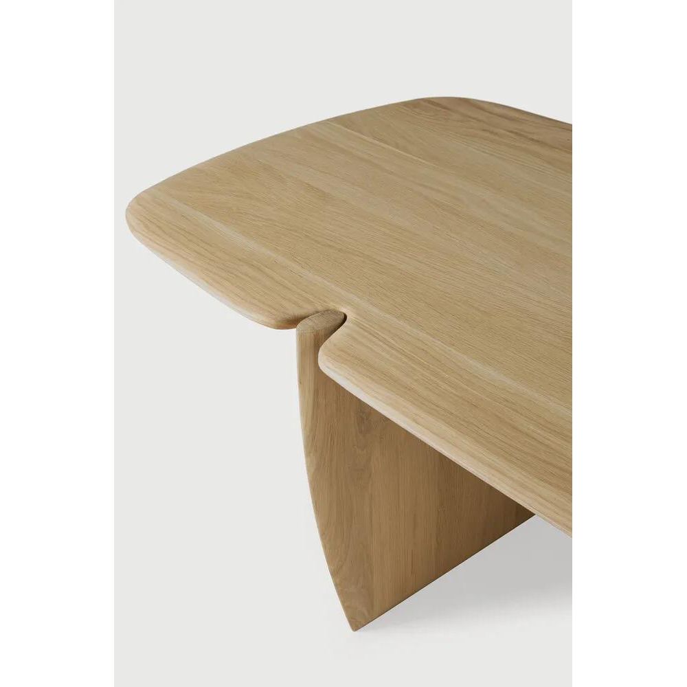 Featuring PI Coffee Table by Ethnicraft at Amethyst Home. The PI collection honours nature’s design, by keeping the strength, curves, and lines, as nature intended. Interesting shapes are discovered in this sleek and stylish, polished imperfect, finish. Each PI coffee table is finished by hand to ensure that the individual character of the wood is respected. . Amethyst Home provides interior design, new home construction design consulting, vintage area rugs, and lighting in the Houston metro area.